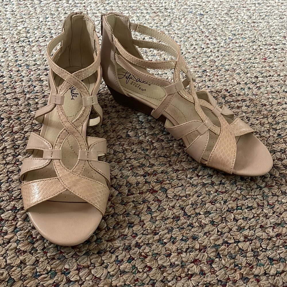 Cream colored wedge sandals